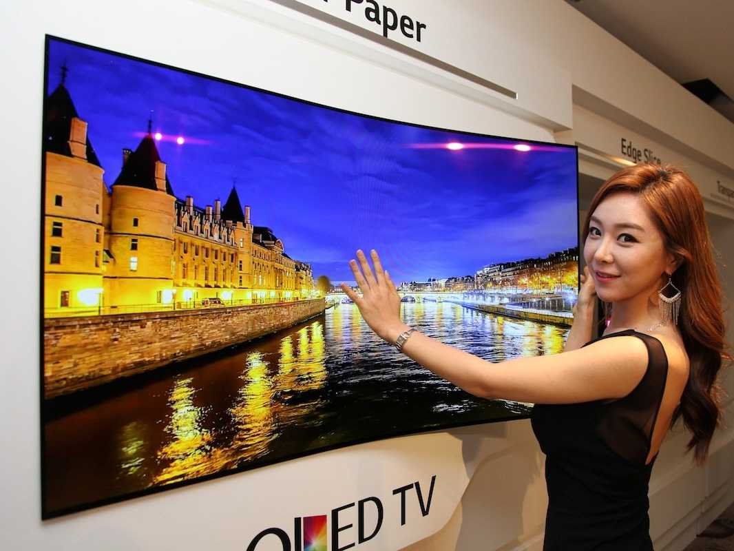 LG invented a bendable TV that sticks to your wall via magnets